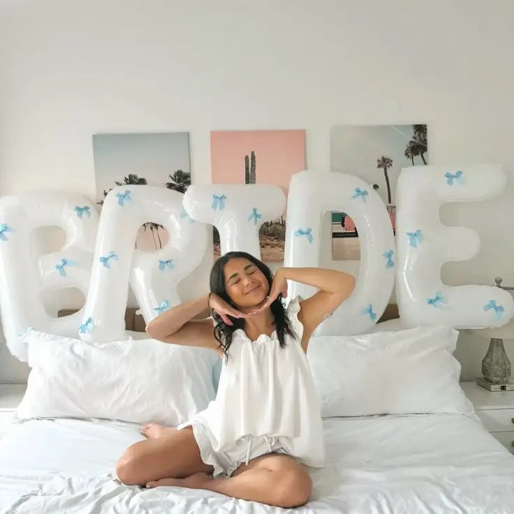 White Bride Balloons with Blue Bows